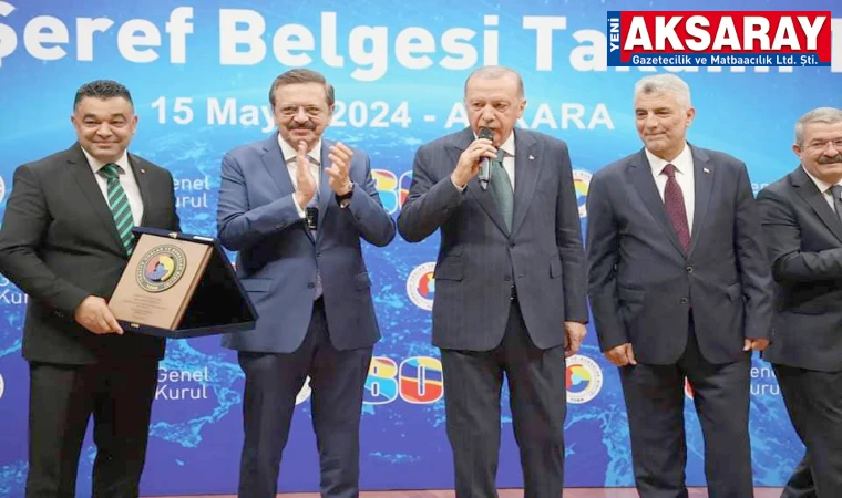 Hizmet Şeref Belgesi aldı