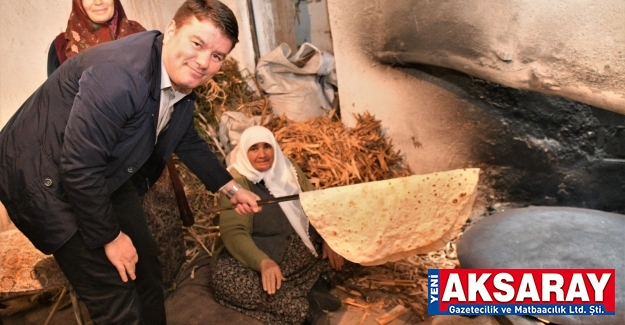 Hamur açtı, tandırda yufka pişirdi