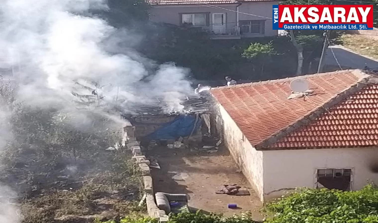 Odunlukta çıkan yangın eve sıçramadan söndürüldü