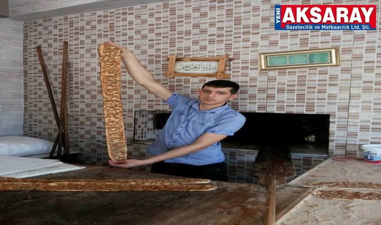 Boyu kadar etli ekmek üret­ti