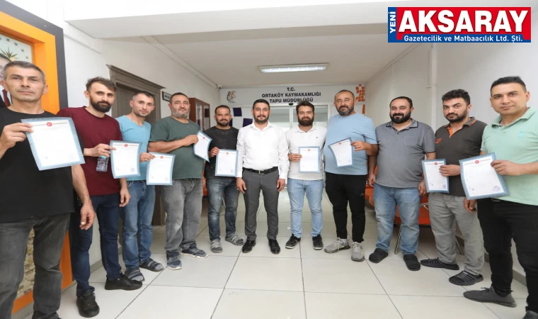 Arsa tahsisi yapılanların tapuları teslim edildi
